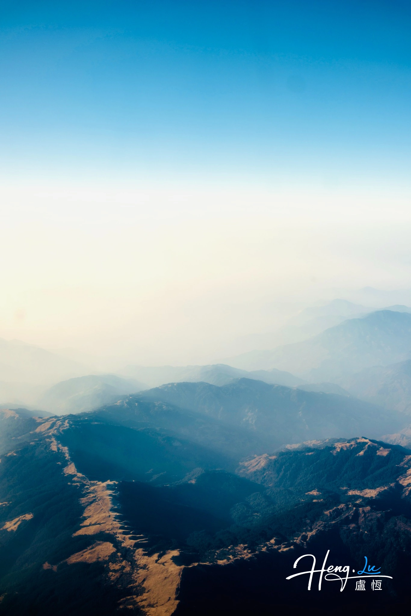 aerial-misty-mountain-ridges.webp
