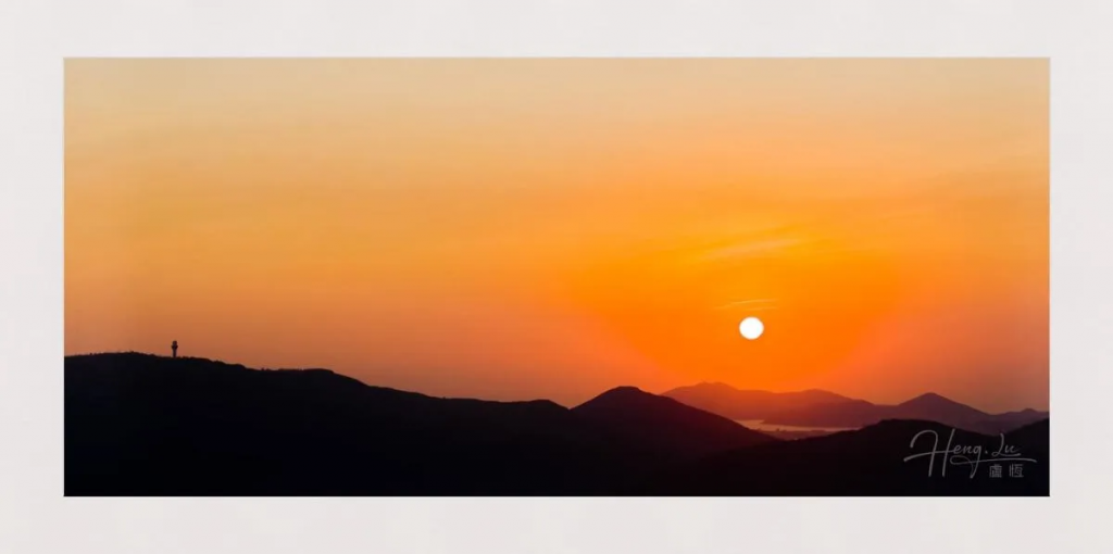breathtaking-sunset-over-silhouetted-hills