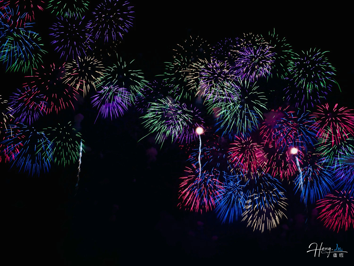 colorful-fireworks-illuminating-dark-night-sky