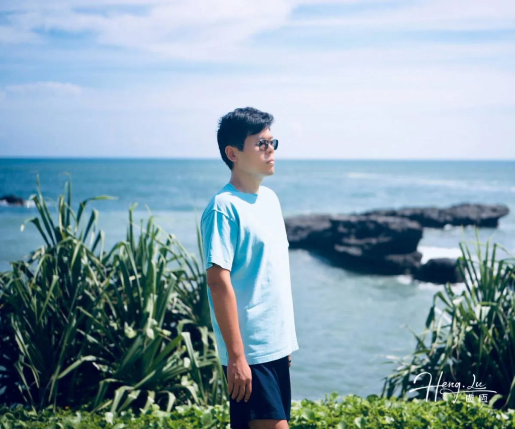 luheng-in-blue-tee-at-ocean-rocks