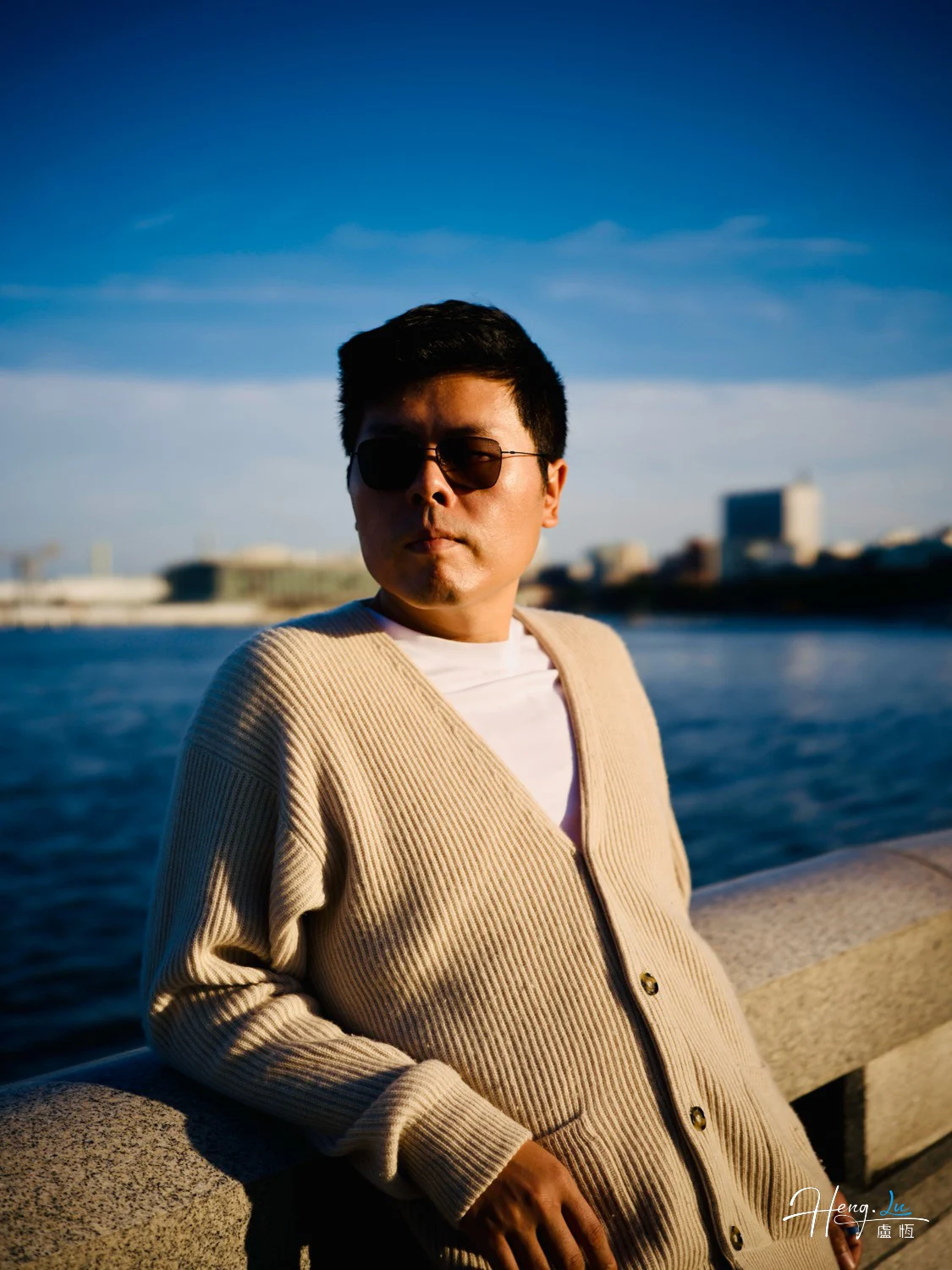 Luheng-in-sunglasses-by-seaside-rail