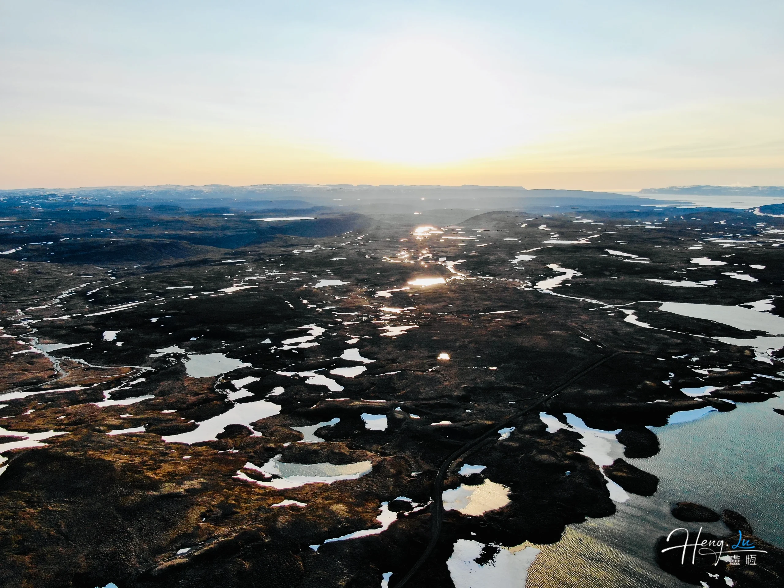 Sunset-over-frozen-lakes