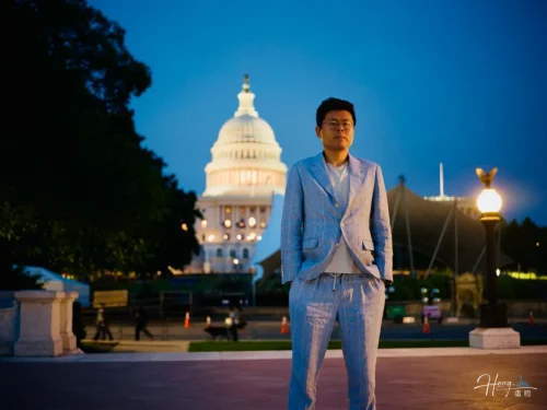 Luheng-in-light-suit-standing-at-night