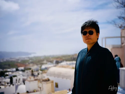 Luheng-standing-outdoors-with-scenic-view