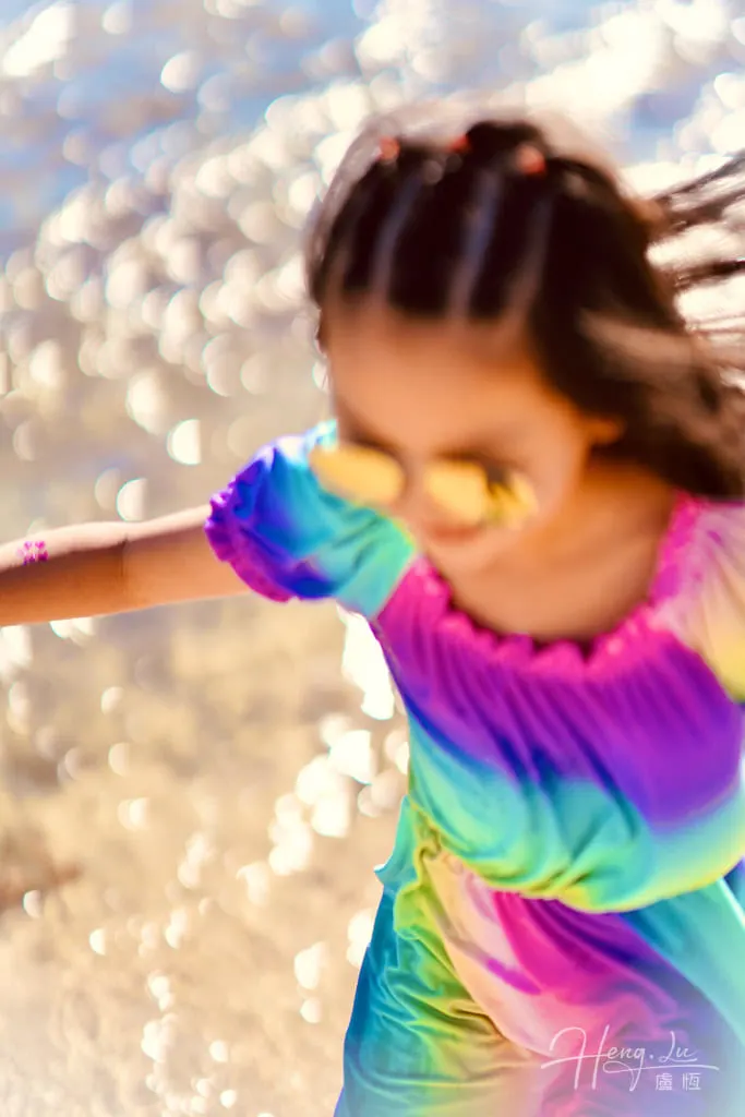 Girl in a rainbow dress
